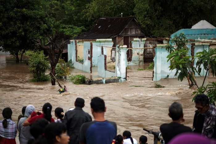 Flash Floods In Indonesia Kill 20; Rescuers Hunt For Missing