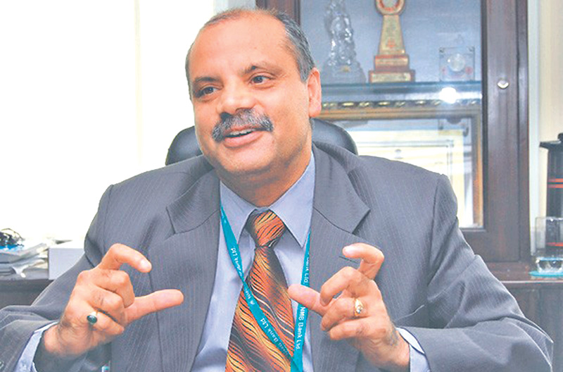 After 30 yrs in banking, Poudel hangs up his boots