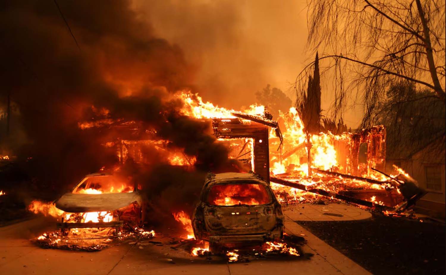 Los Angeles wildfires devour more homes even as fierce winds start to ease