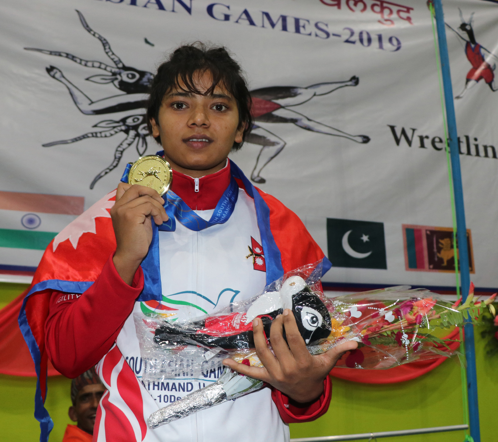 Dhami claims first wrestling gold for Nepal