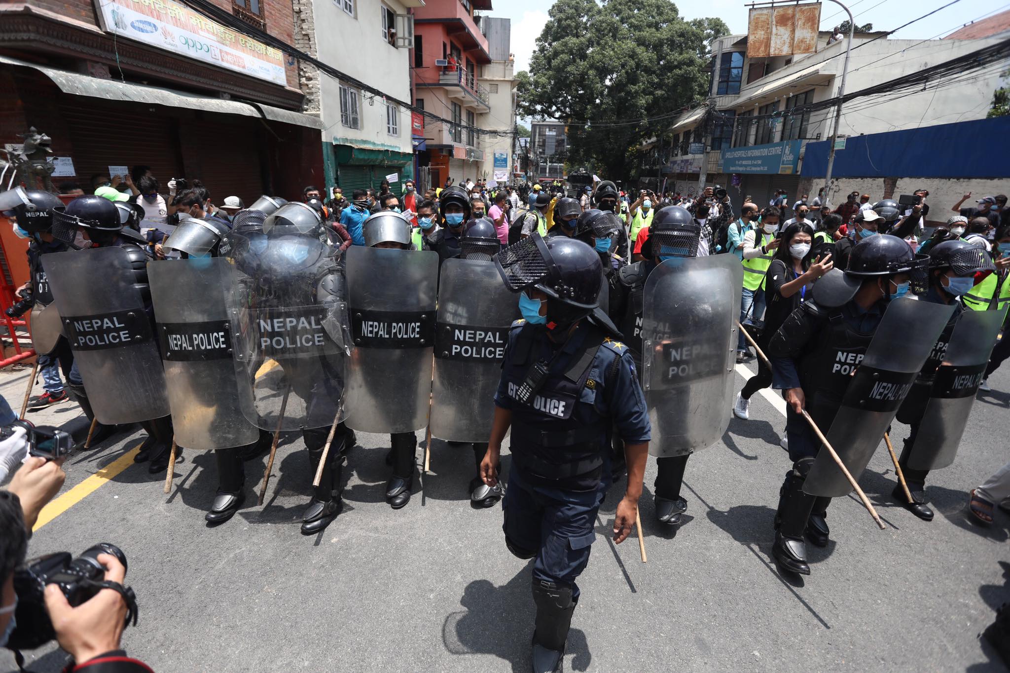 Police use teargas, water cannons to disperse protesters