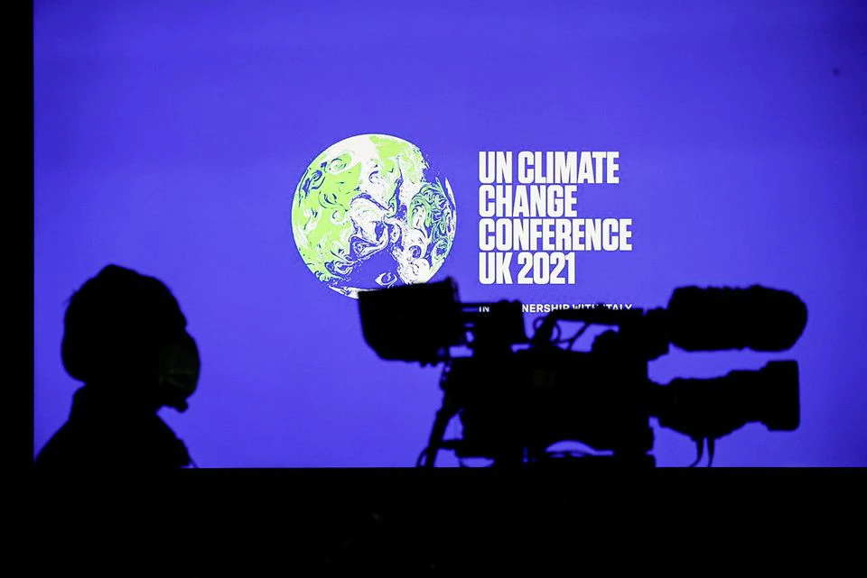 UK draft climate deal urges countries to step up climate goals