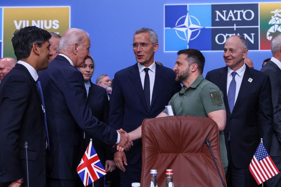 NATO allies offer Ukraine security assurances as Biden hits out at ...