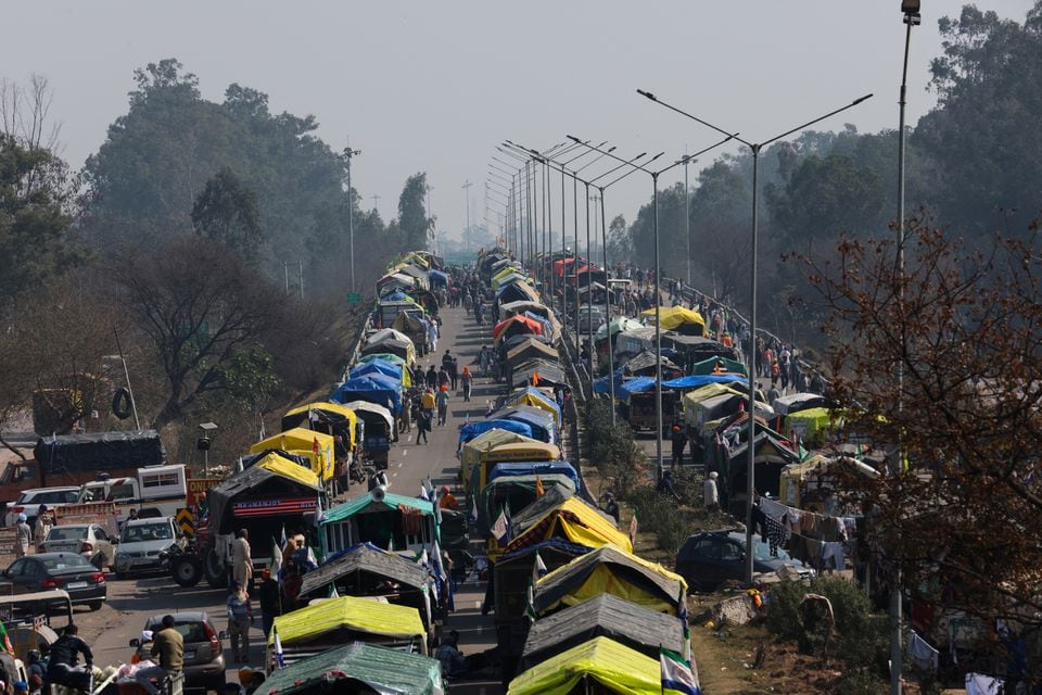 Indian farmers to postpone protest march to Delhi as talks with govt ...