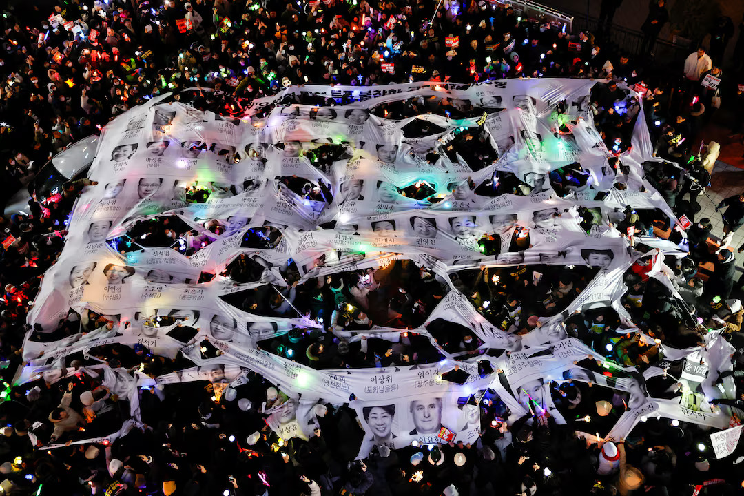 South Korean President Yoon vows to ‘fight to the end’, defying impeachment threat