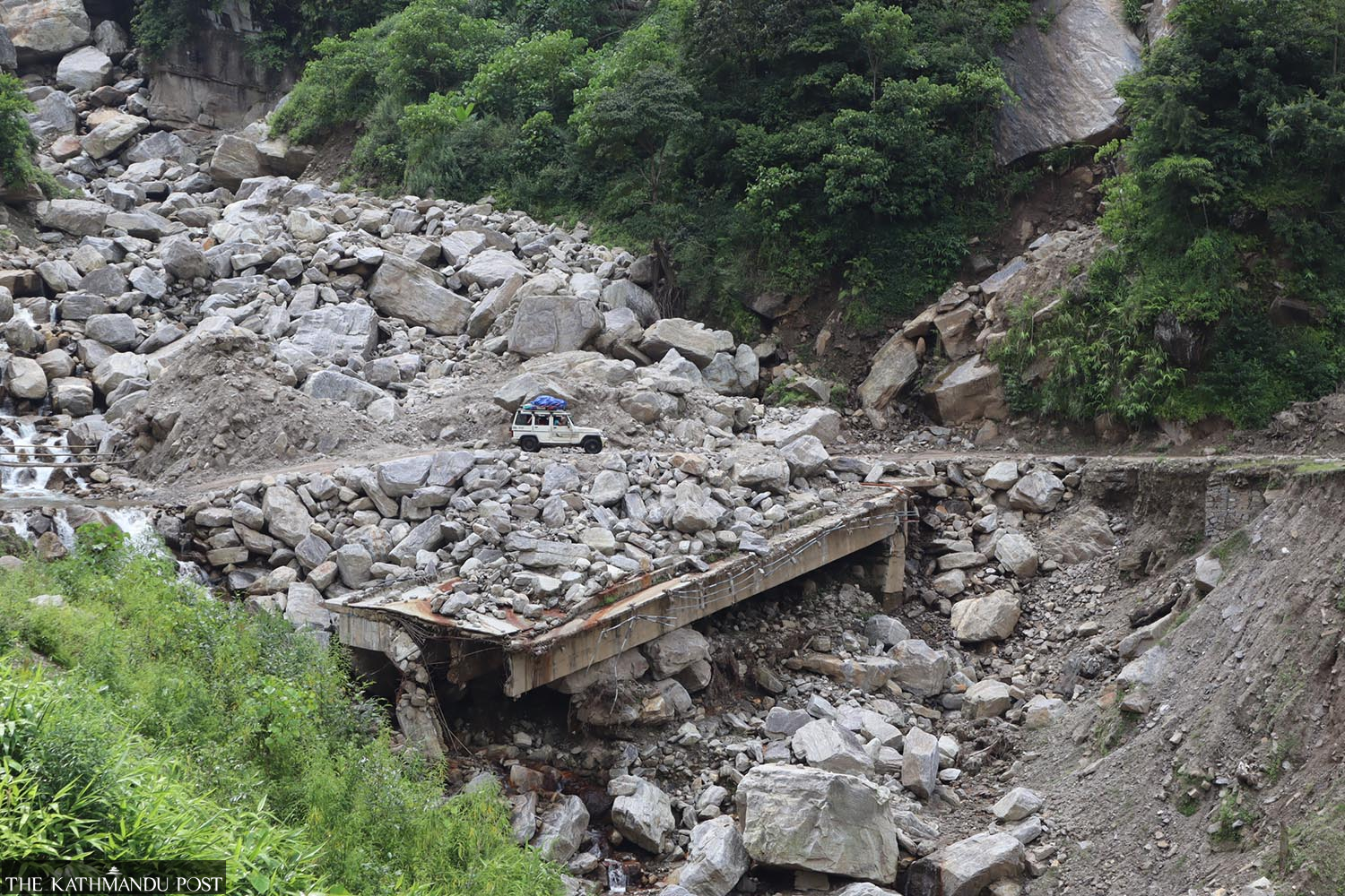 Work halted along Mid-Hill Highway as unpaid labourers abandon construction site