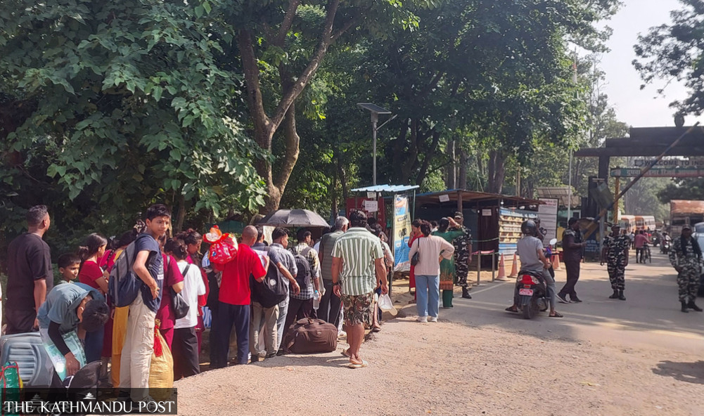 Poverty-stricken workers flock to India, leaving festivities behind