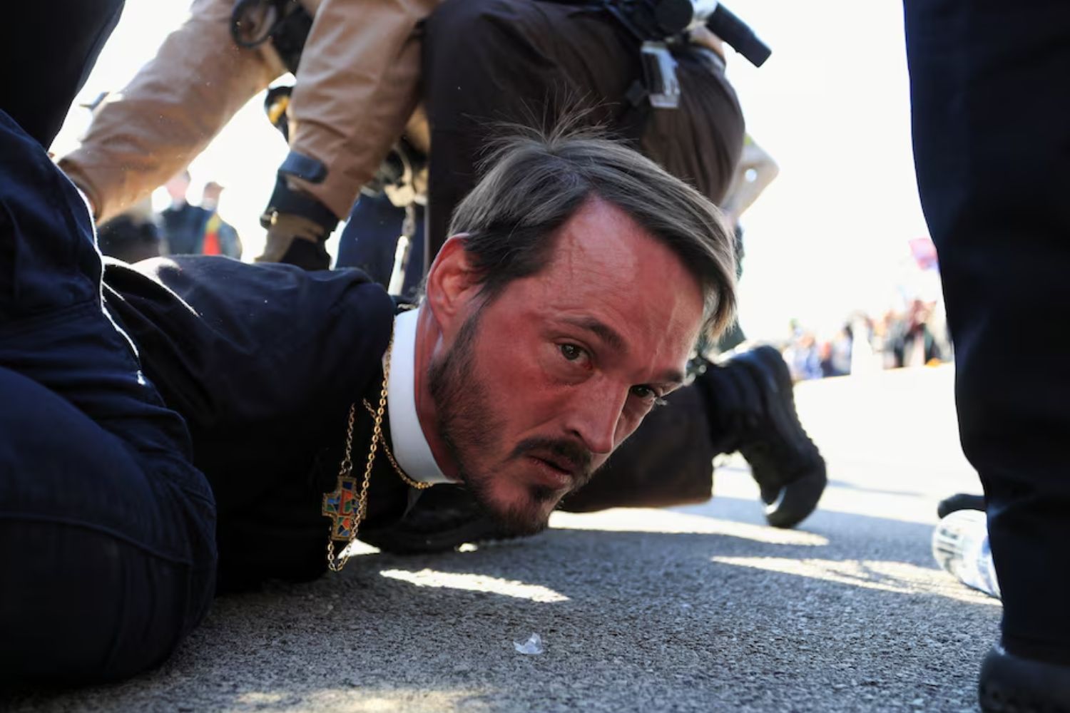 Nearly two dozen arrested as faith leaders protest outside Chicago-area ICE facility