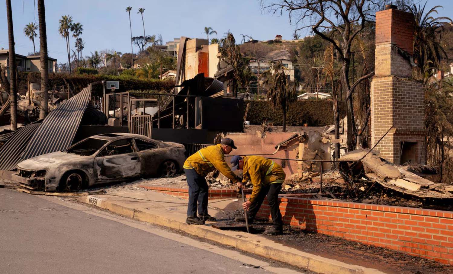 Los Angeles firefighters make progress as intense winds ease - for now