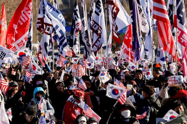 Defiant South Korean President faces more questioning, impeachment hearing