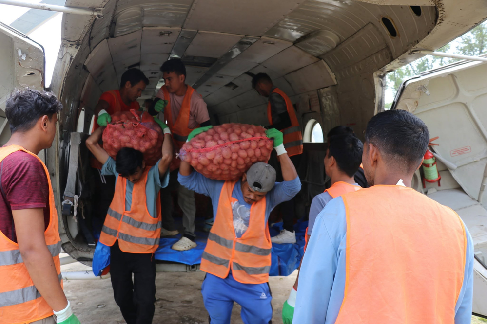 Nepal: Relief helicopter delivers vegetables to market for flood-isolated farmers