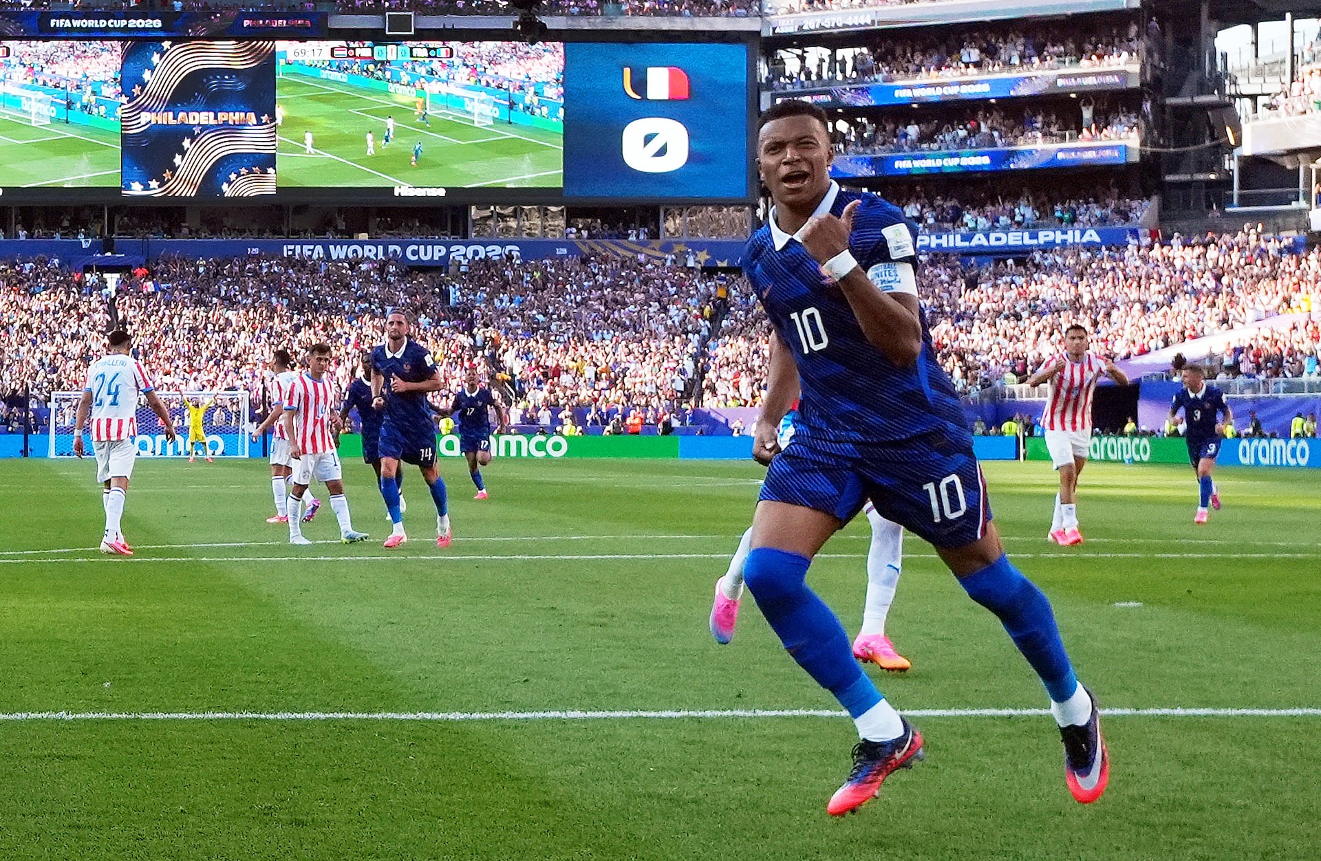 Mbappe keeps cool as France survive furnace against Paraguay