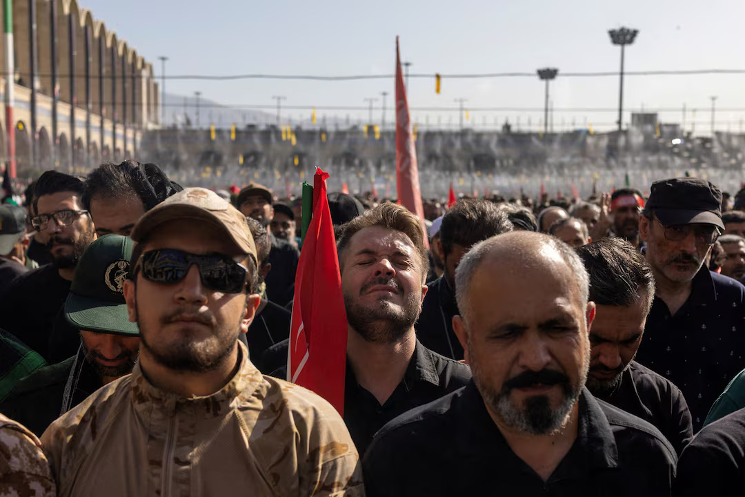 Three sons of Iran’s slain leader Khamenei appear at funeral, not his successor